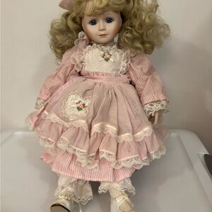 Pink Porcelain Doll with Curly Blonde Hair